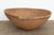 At a commanding 31 inches wide, this oversized nomadic winnowing bowl is a breathtaking artifact of functional tribal...