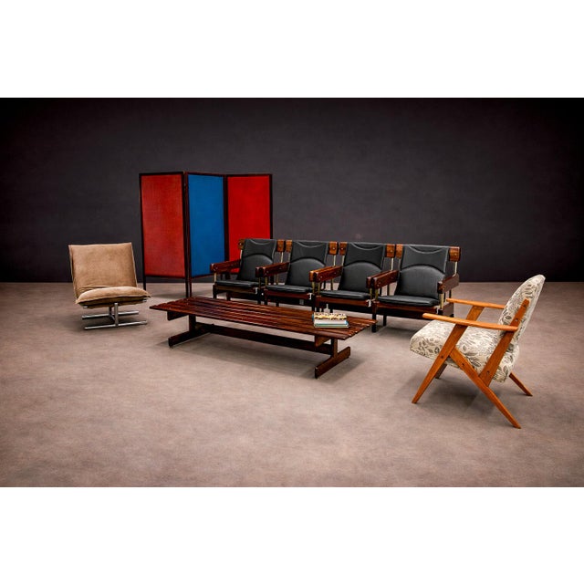 Designed for auditorium and institutional settings in Brazil during the 1960s–70s, this pair of double Longarina seating...