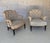 A classic pair of small scale French 19th century Napoleon III style armchairs with elegantly scrolled arms, gently curved...