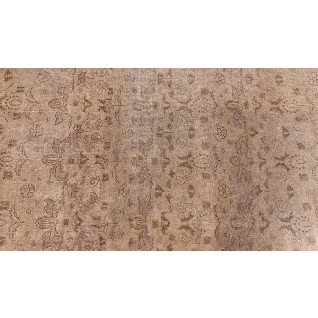 Crafted in the early 20th century, this antique Turkish Sivas rug (circa 1920) is a compelling example of understated...