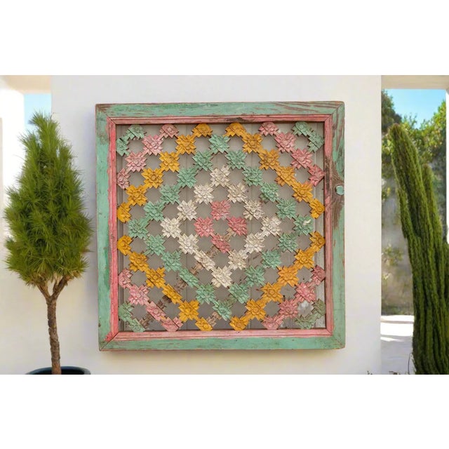 A traditional architectural feature of Chinese buildings, this beautiful antique Chinese lattice window was prominent in...