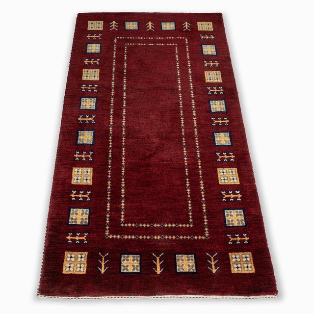 Gabbeh is a hand-woven rug traditionally made by the nomadic people. Gabbeh rugs are made from hand-spun wool dyed with...