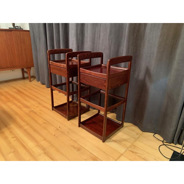 A pair of shelves and cabinets from the 1970s. In original and good condition. There are traces of water on the polish on...
