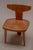 An elegant and characterful pair of Danish modern side chairs designed by Jacob Kielland-Brandt for I. Christiansen,...