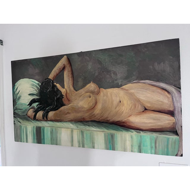An original mid-century oil on canvas depicting a reclining female nude rendered with expressive, painterly brushwork and...
