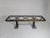 Dining table (260 cm x 80 cm) with a chromed metal and oak base. The glass top is set in a carved oak frame that...