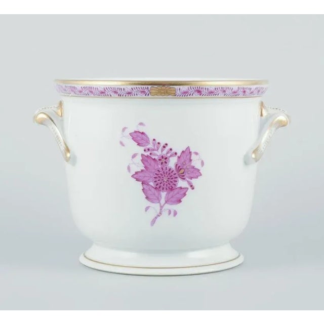 Herend, Hungary. "Apponyi" flowerpot. Hand painted with purple floral motifs and gold decoration. Circa 1970s. Marked....