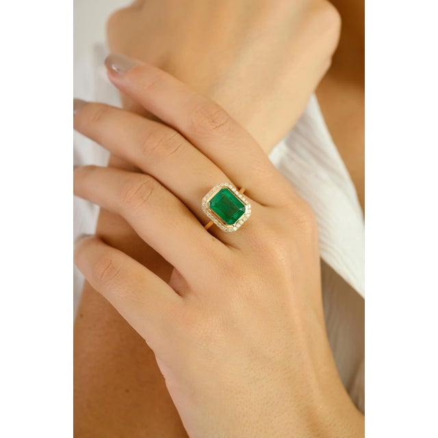 A bold expression of elegance and timeless style, this exquisite ring is crafted in rich 14k yellow gold and showcases a...