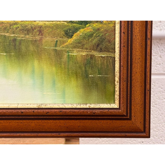Golden haze settles on calm waters, holding a cottage in quiet reverie 1975 Circa For Sale - Image 16 of 18