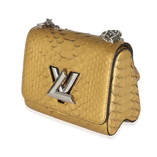 The Louis Vuitton Twist collection was unveiled in 2015. The accessory features a chunky monogram logo on the front for a...