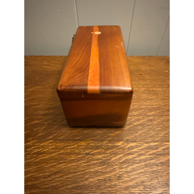 This vintage item is a Lane Miniature Cedar Chest, a popular mid-century keepsake often given to high school graduates as...