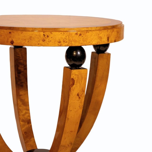 A refined Art Deco table for today’s interiors, with the iconic silhouette and elegant contrast of burl walnut and high-...