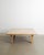 A very beautiful squared Danish mid century modern coffee table with four asymmetrical legs and a squared top in stained...