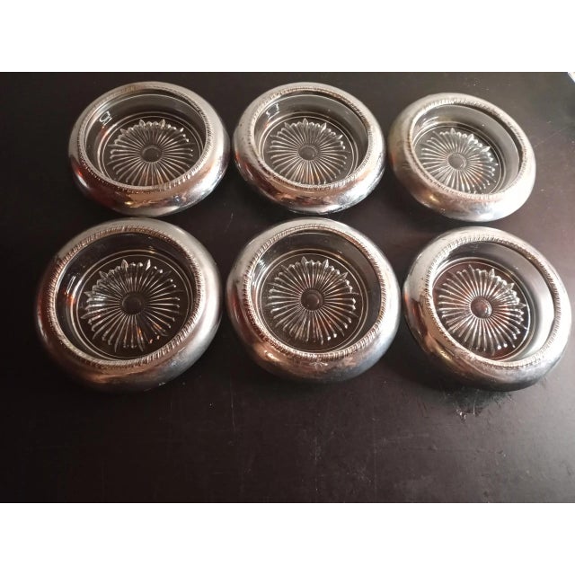 These are vintage Silverplated Rim 4" Starburst Glass Coasters Set of 6. Procured at auction BOX 15