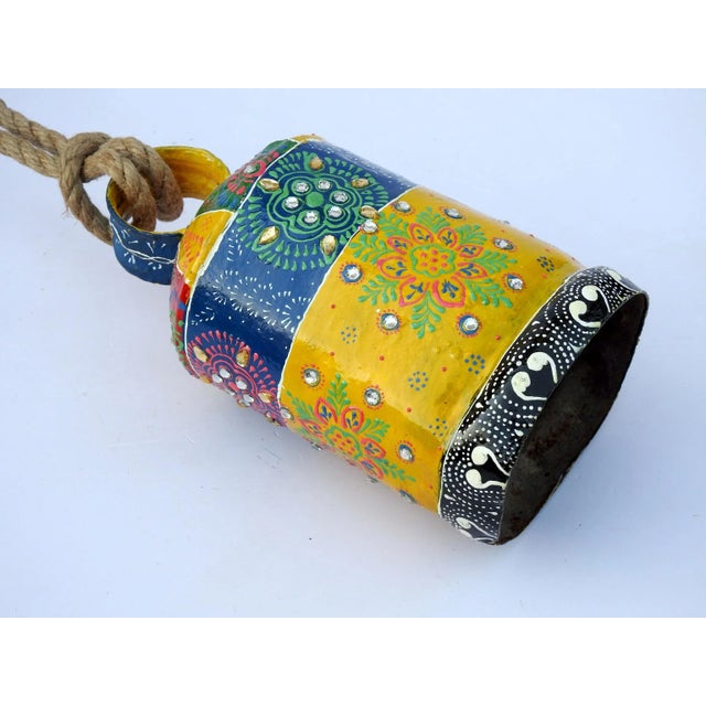 The bell is made of iron and coated primarily with copper, along with a few other metals. They are made from scrap iron...