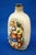 A delightful glazed ceramic bottle with a satin finish, featuring a central bas-relief decoration depicting a pair of...