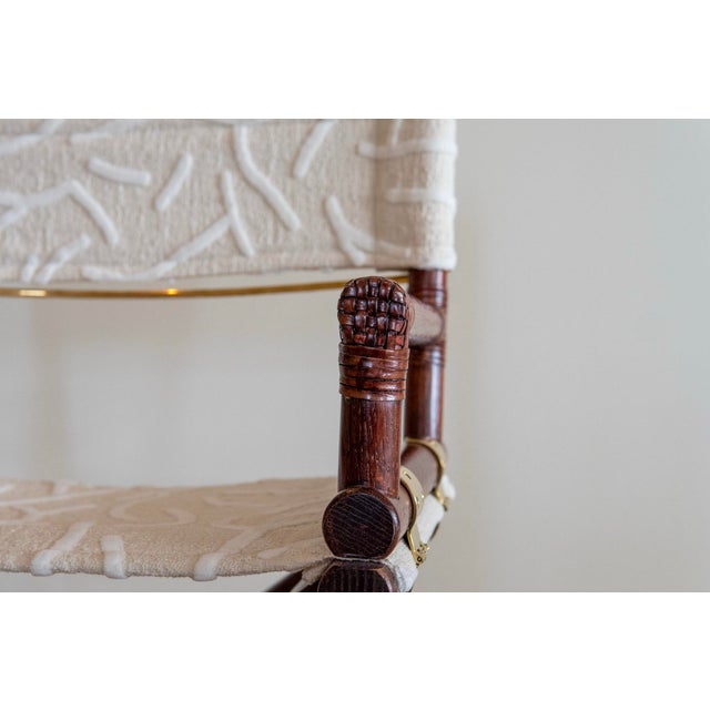 Classic 1970s McGuire director’s chair that blends organic materials with refined construction, featuring a solid wood...