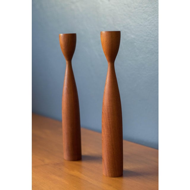 Vintage pair of Danish modern teak candleholders circa 1960's. This set displays well with any modern home decor and fits...