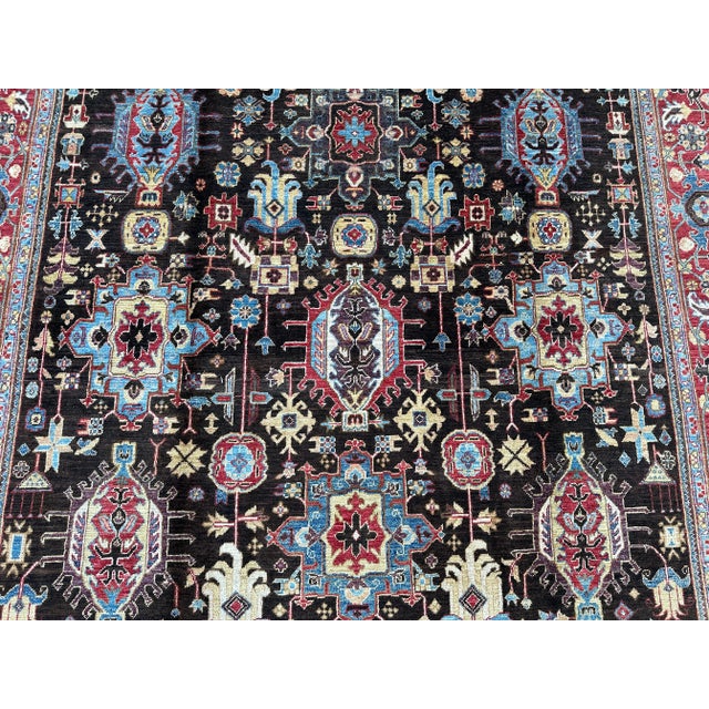 This beautiful 100% wool hand-knotted rug is a vintage piece, Handmade by Afghan Turkmen women in the heart of...