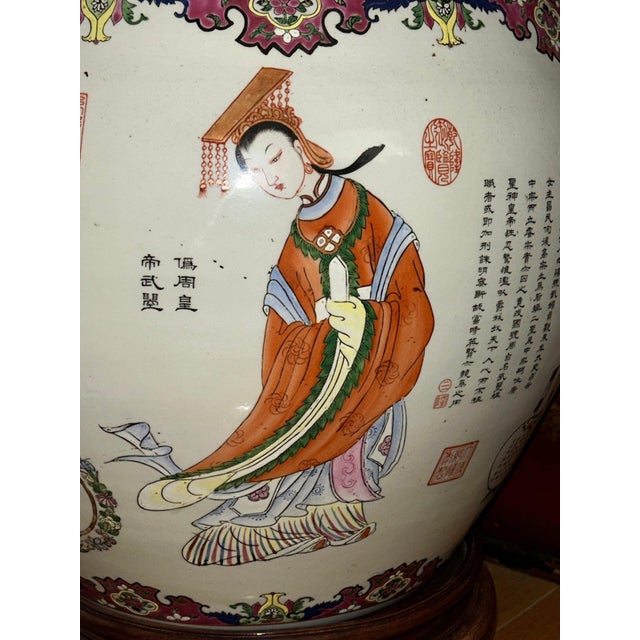 A very large, hefty, and masterfully hand-painted antique Chinese fishbowl of the Qing Dynasty under the Qianlong Emperor....