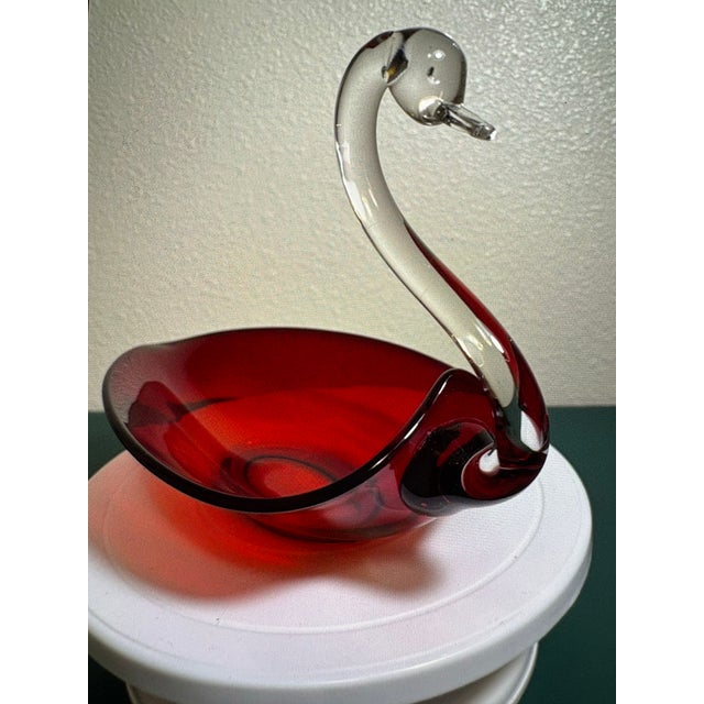 This hand blown art glass bowl or candy dish is in wonderful condition with no chips, cracks or scratches. It is carefully...