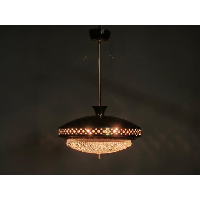Sculptural space age ufo pendant light by ludib bratislava, produced in czechoslovakia during the 1960s. This distinctive...