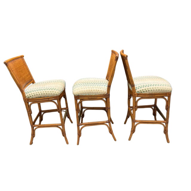 Bring resort-style luxury into your home with this set of 3 Tommy Bahama rattan bar stools, crafted with the brand's...
