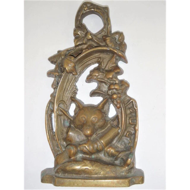 Charming Fox relief cast Brass doorstop. Fox hunting motif with lovely leaves and vine details at top, with hunting boots...