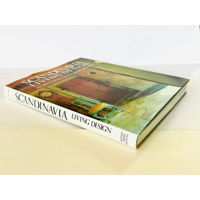 This hardcover book features Nordic homes, covering styles from postmodern apartments to forest manors including...