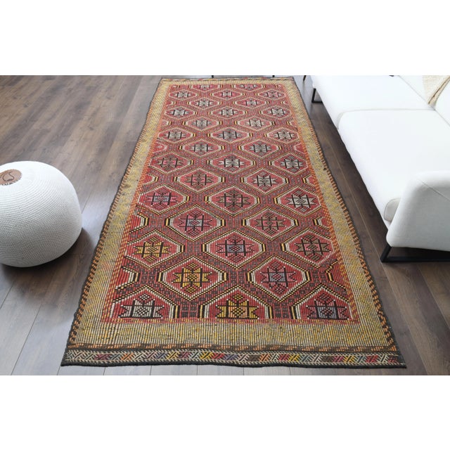 Vintage Turkish Hand-Knotted vintage rug is a semi-antique vintage area rug.'70s Eastern region of Turkey's unique rug is...