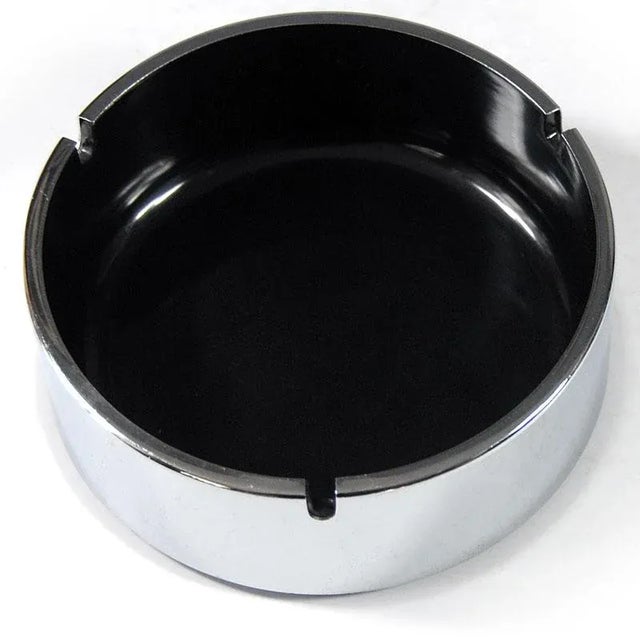 A unique, effective ashtray designed by Japanese designer Isamu Kenmochi. It is made of black plastic and finished with...
