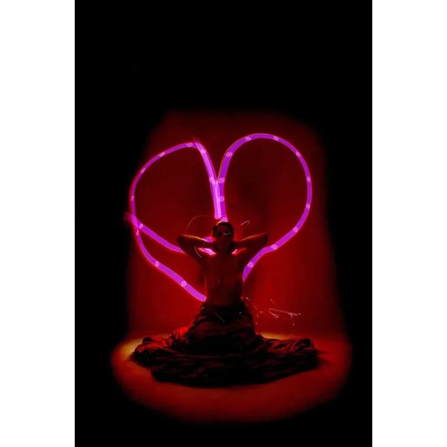 Light painting technique, realized in a completely dark photographic studio, where the photographer manually "paint" by...