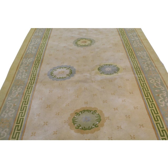 Hand-knotted with care using traditional rug-making techniques, this wool rug blends timeless craftsmanship with a modern...