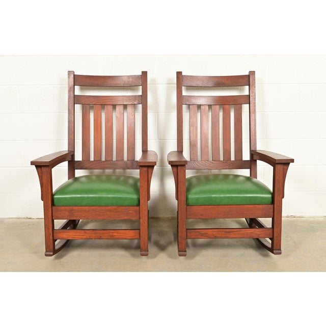 A gorgeous pair of antique Mission or Arts & Crafts period rocking chairs In the manner of Stickley Brothers USA, Early...