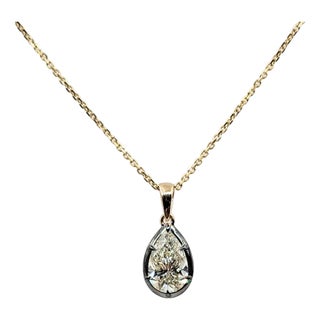 1.51 Ct Gia Certified Natural Pear-Cut Diamond in Collet Pendant Setting For Sale