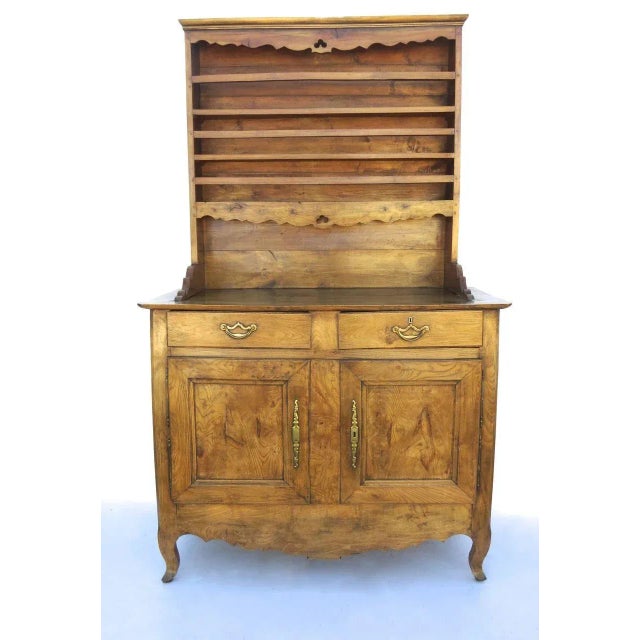 French elm vaisselier buffet. Shaped shelf fronts. Two doors and two drawers.53 x 23 x 87