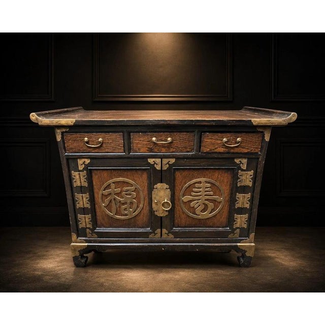 A beautifully decorative chinese-style solid wood cabinet or sideboard, combining traditional oriental-inspired design...
