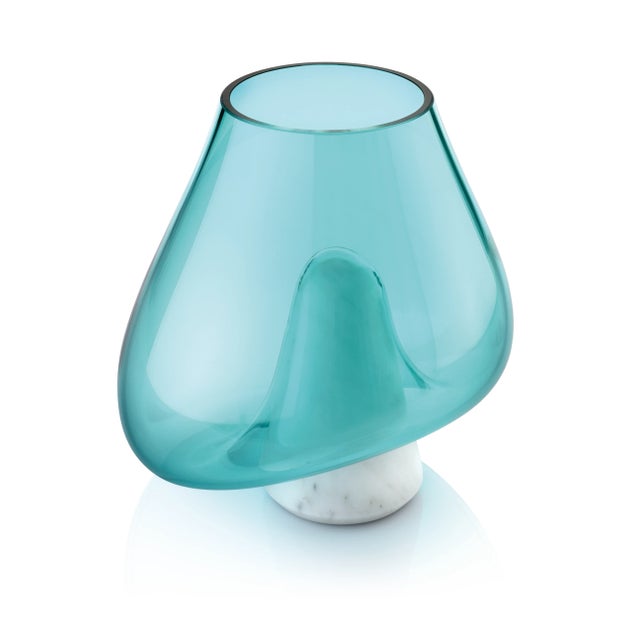 The Cumuli Blue Glass Vase Collection is part of the collection in Basaltina stone or Carrara White marble and offhand...