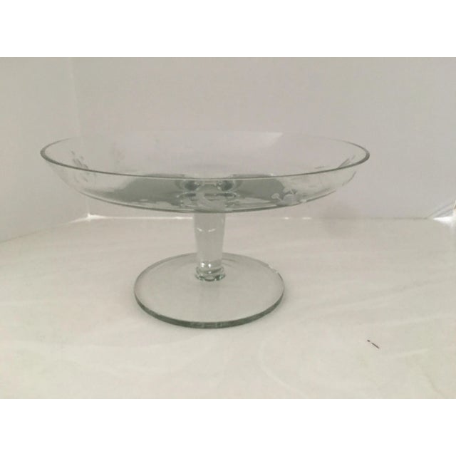 Make your holidays a little more festive with this vintage etched crystal cake stand. Measures 12” x12” x 6.25” high.