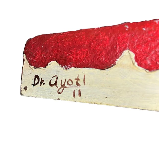 This striking vintage wall plaque is a fine example of traditional Mexican folk art. Featuring a textured surface, the...