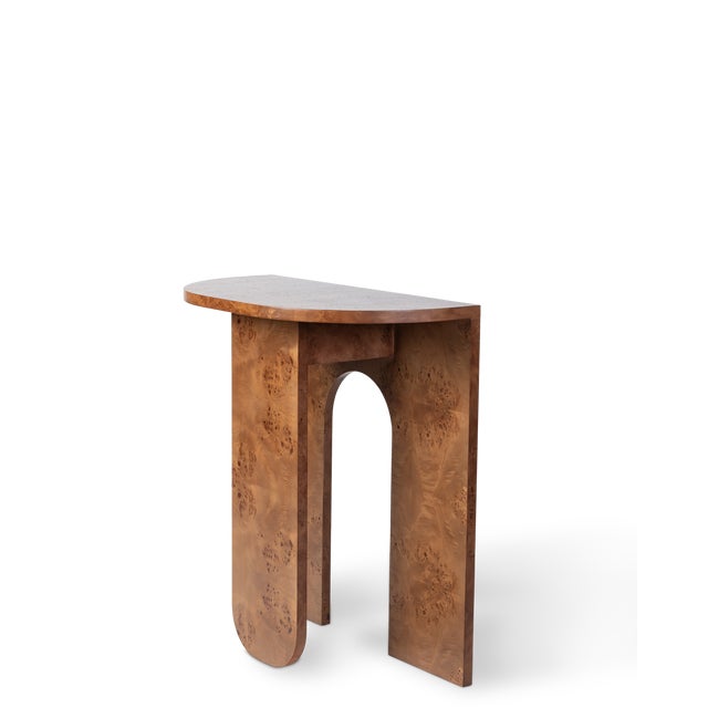 The demilune shape of the console adds a sense of grace and timeless appeal to your living space. Its half-moon design...