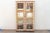 A charming bleached wood & mother of pearl inlay tall glass cabinet. Made from reclaimed teak, this large reconstructed...
