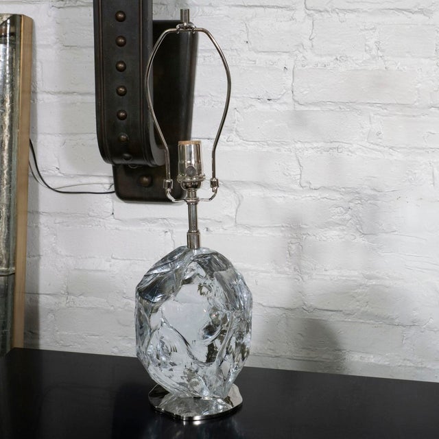 Pair of sculptural glass block "fragment" table lamps with organic nickel plated bases.
