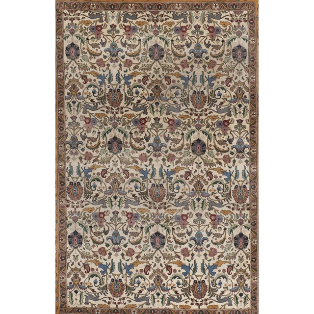 A beautiful hand-knotted rug, traditionally crafted by skilled artisans using fine-quality wool. The hand-knotted...