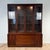 Broyhill Brasilia walnut buffet and hutch, featuring their iconic sculpted wood accents on the doors, solid brass...
