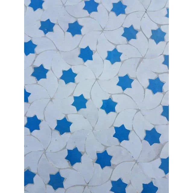 Custom made glazed Moroccan mosaic table measuring 48" in diameter. An indoor / outdoor dining table that sits up to six...