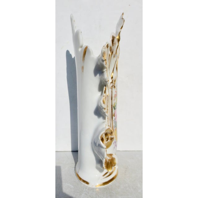 Rococo Revival featuring ornate foliate (leaf-like) forms and gilded highlights. Hand-painted floral motifs on a white...