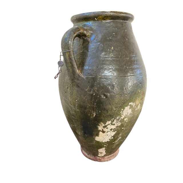 Large antique pottery vessel imported from Morocco, procured for Frodahl Designs. Measures 16"H x 10.5"W.