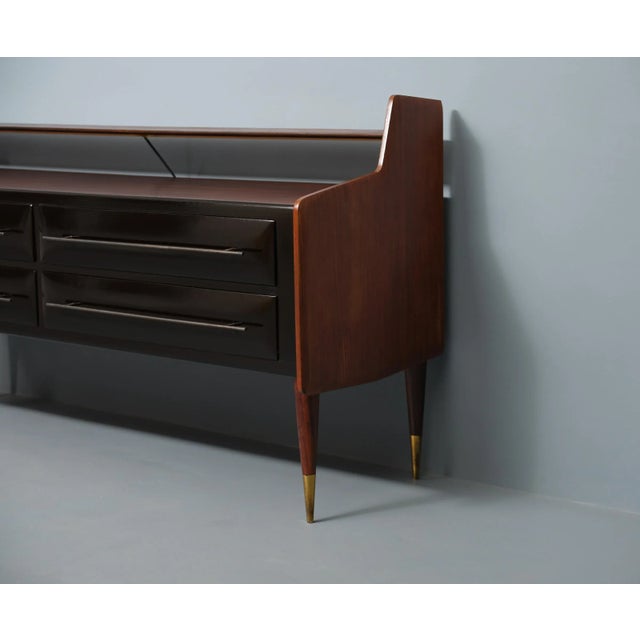 Introducing a remarkable piece of Italian craftsmanship from the 1950s, this vintage chest of drawers is a true testament...