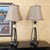Matched pair of Uttermost table lamps, likely late 1990s–2000s, with Traditional/Old World styling and subtle...
